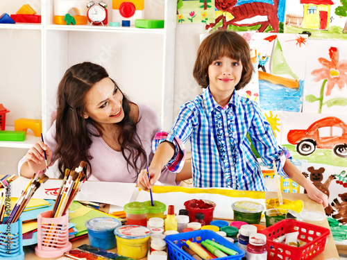 Photo: Family with child painting . Family with child painting .