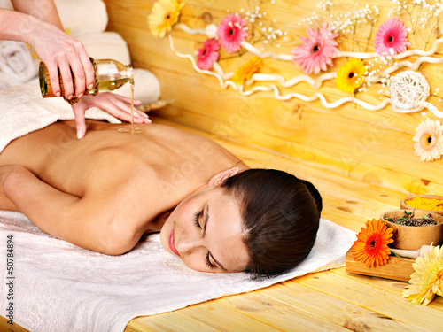 Photo: Woman getting massage . Woman getting massage .