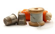 Sewing thimbles, bobbins and needle