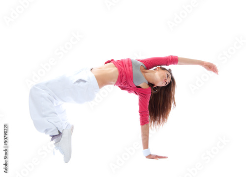 Photo: modern slim hip-hop style teenage girl jumping dancing modern slim hip-hop style teenage girl jumping dancing