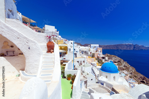 Photo: White architecture of Oia village on Santorini island, Greece White architecture of Oia village on Santorini island, Greece