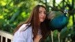 wild park with girl and peacock.