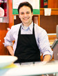Happy shopkeeper