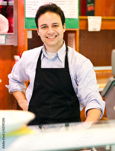 Photo: Happy shopkeeper Happy shopkeeper