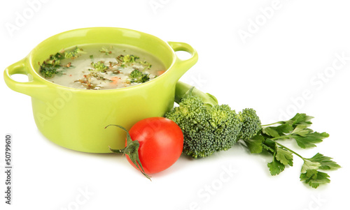 Photo: Diet soup with vegetables in pan isolated on white Diet soup with vegetables in pan isolated on white