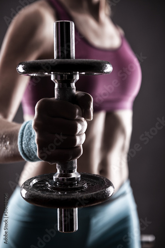 Photo: gymnast doing weights gymnast doing weights
