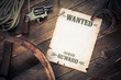 Foto: Old wanted poster on wood with vintage objects Old wanted poster on wood with vintage objects