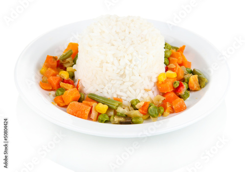 Photo: Delicious risotto with vegetables isolated on white Delicious risotto with vegetables isolated on white