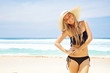 woman in hat on the beach