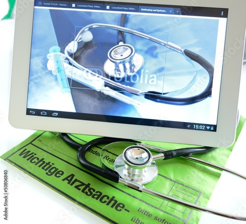 Photo: Tablet PC mit Stethoskop beim Arzt Tablet PC mit Stethoskop beim Arzt