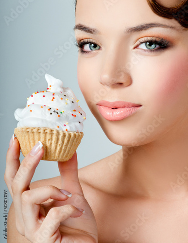 Photo: beautiful girl eats cake beautiful girl eats cake
