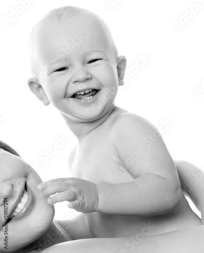Photo: Young mother hugging baby Young mother hugging baby