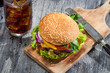 Photo: Homemade burger and a Coke with ice Homemade burger and a Coke with ice