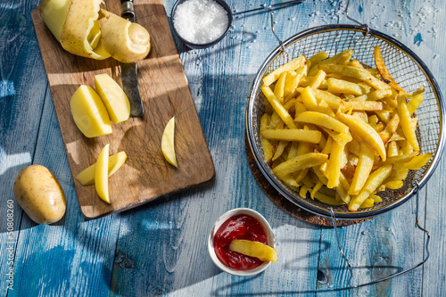 Photo: Homemade French fries made from potatoes Homemade French fries made from potatoes