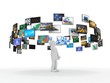 A technology man has images around his head. 3D images