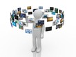 A technology man has images around his head. 3D images