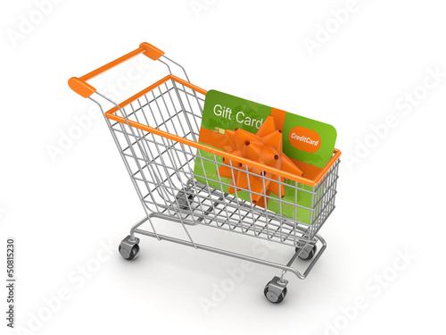 Photo: Shopping trolley with credit card. Shopping trolley with credit card.