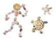 seashells in the shape of human with two turtles