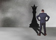 businessman with chess king shadow