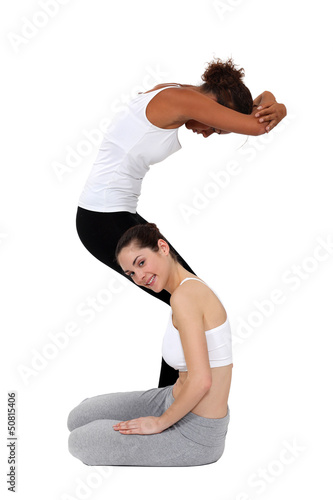 Photo: Two female gymnasts Two female gymnasts