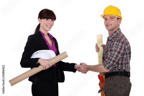 Photo: businesswoman and craftsman businesswoman and craftsman