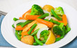 Photo: Mixed vegetables on a plate Mixed vegetables on a plate