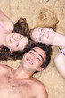 Teens relaxing at the beach