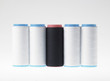 White on white, spools of thread on white background