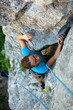 Woman Practices In Climbing At...