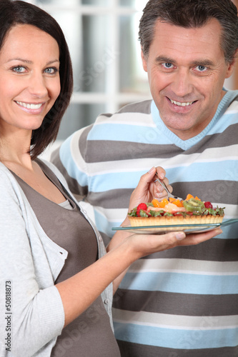 Photo: Couple eating cake Couple eating cake
