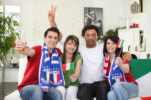 Photo: Italian football supporters at home Italian football supporters at home