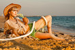 woman laying at beach