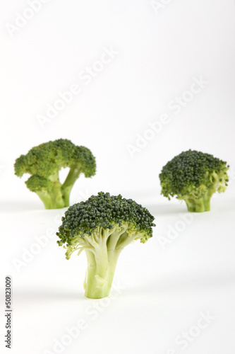Photo: Fresh broccoli isolated on white background Fresh broccoli isolated on white background