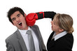 Woman punching her colleague