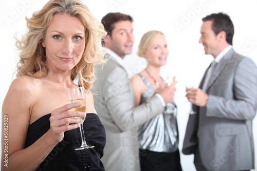 Photo: Two couples celebrating Two couples celebrating