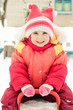  little girl in a red jacket