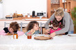 Young children eating crepes