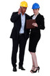 Businesspeople holding a clipboard