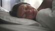 Portrait of a young girl sleeping on a pillow