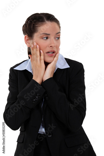 Photo: A terrified businesswoman. A terrified businesswoman.