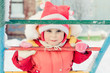 Beautiful happy kid in the red jacket