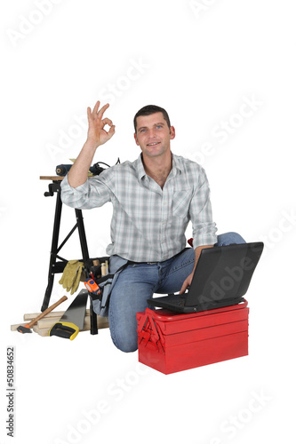 Photo: craftsman making an okay sign craftsman making an okay sign