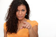 Women with curly hair pointing