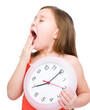 Little girl is holding big clock