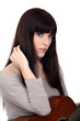 Brunette woman with guitar