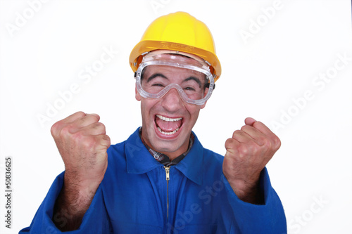 Photo: An ecstatic construction worker. An ecstatic construction worker.