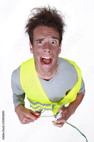 Photo: electrician having an electric shock electrician having an electric shock
