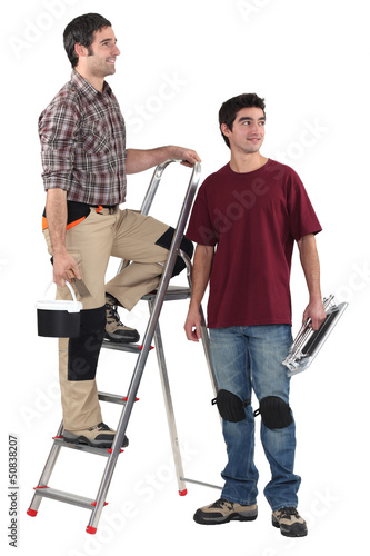 Photo: Two decorator stood with step-ladder Two decorator stood with step-ladder