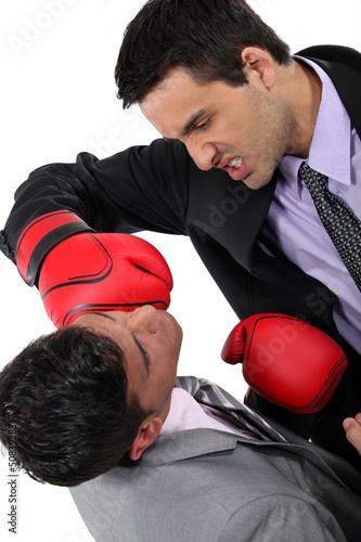 Photo: Two businessmen boxing Two businessmen boxing