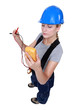 Woman taking electrical reading